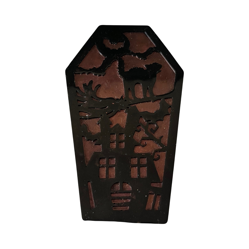 Coffin Shaped Fridge Magnets - A coffin-shaped Halloween fridge magnet, featuring a haunted house, cat, and full moon design, shown against a plain white background