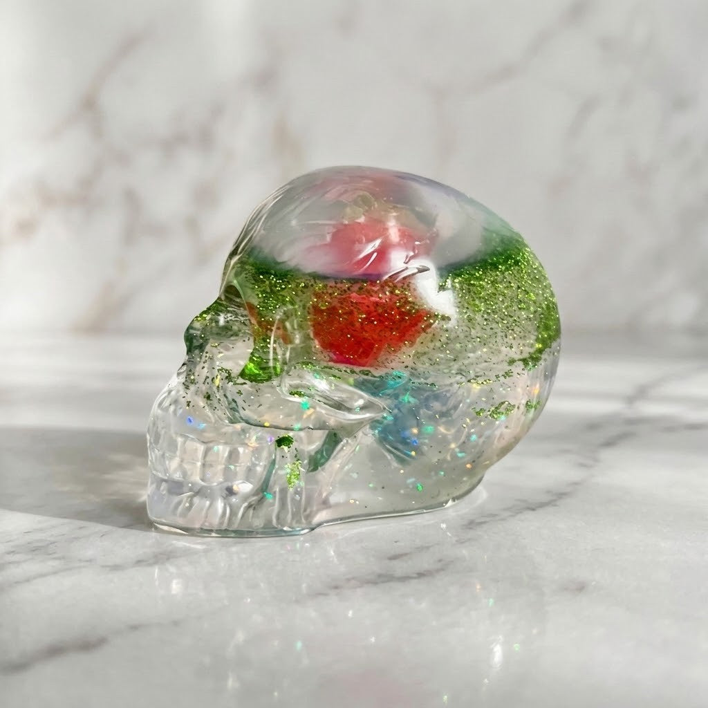 Novelty Shaker Skull figurine made from handmade resin with colorful embedded water ball.