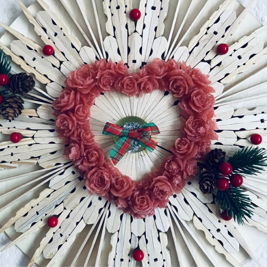 Wooden Christmas Wreath handmade wall art featuring a heart-shaped floral design and rustic elements.